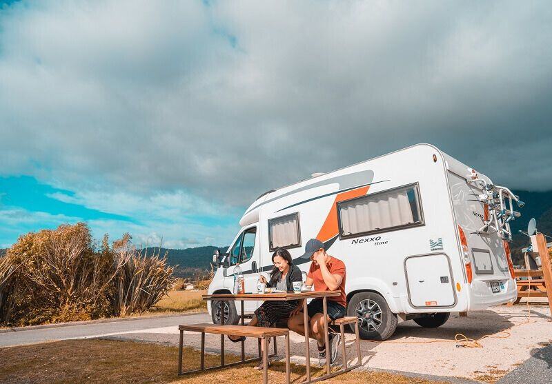 Dinner outside of a Wilderness campervan