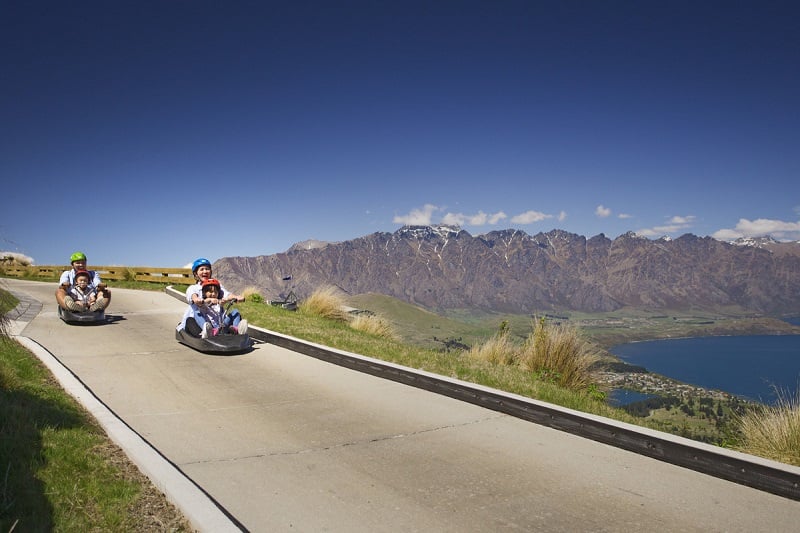 Family lugeing in Queenstown New Zealand