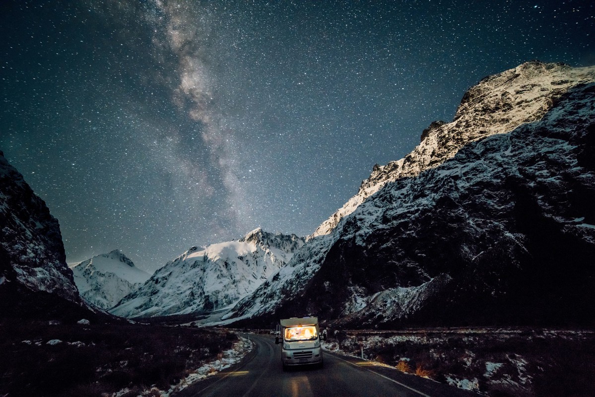 Freedom camping in mountains on the road under the stars