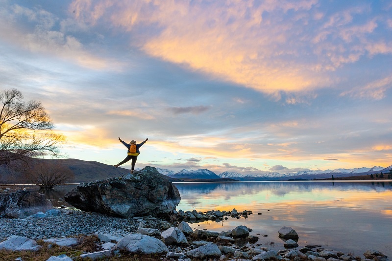 Girl watching at Lake Tekapo New Zealand