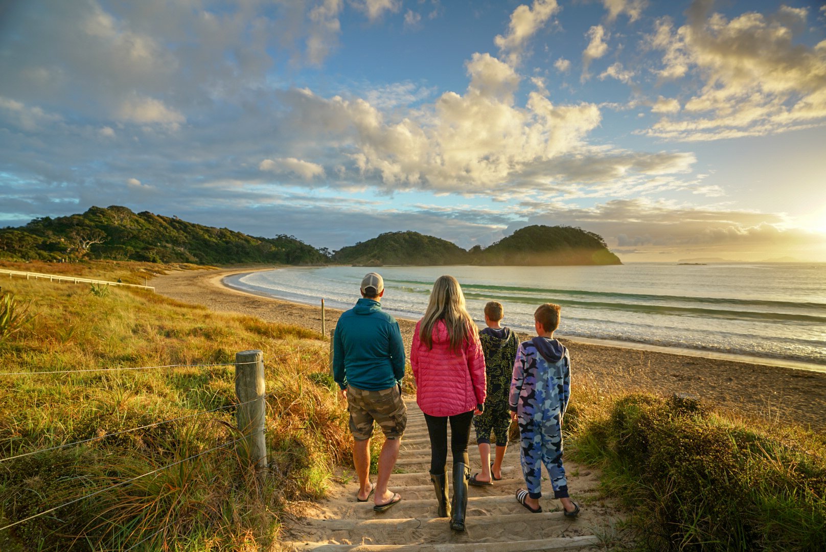 RS21742_Family beach walk Matapouri Bay