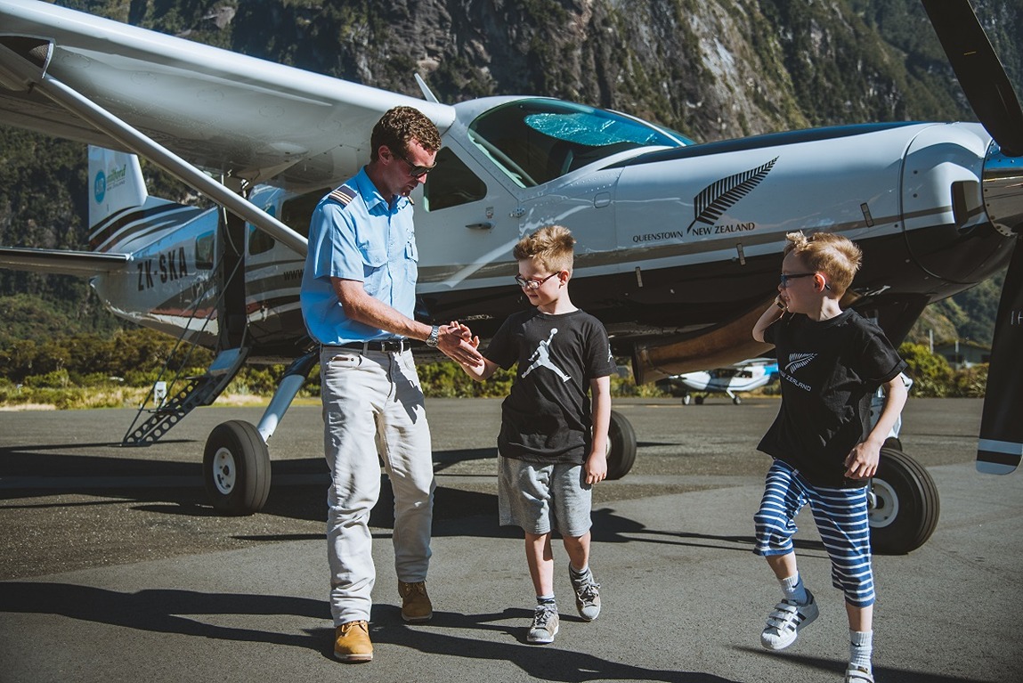 Kids arriving from Milford Sound scenic flight