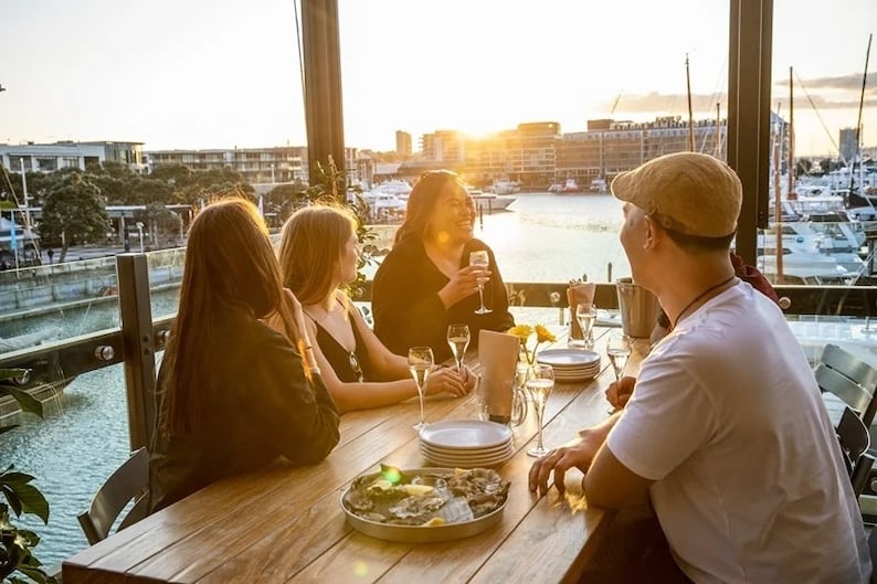 Four people dining at the Viaduct