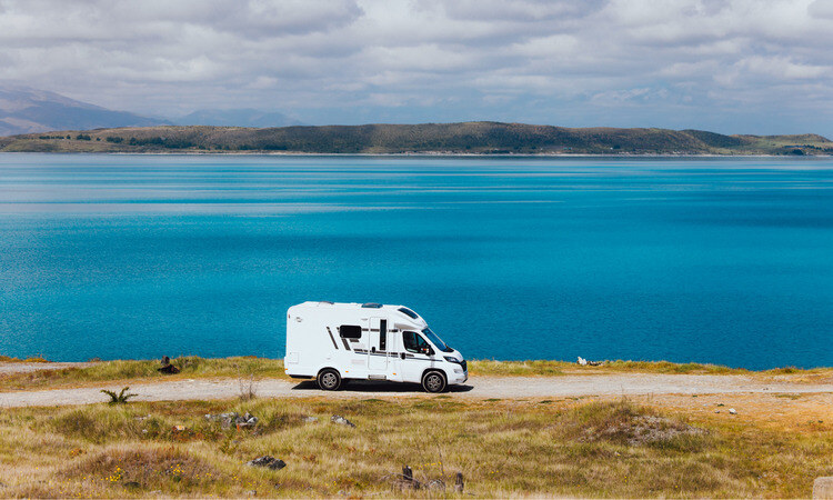 A Compact for 2 Wilderness motorhome parked up beside Lake Pukaki, New Zealand