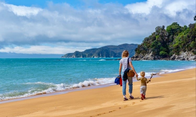 03- walking on beach 750x450