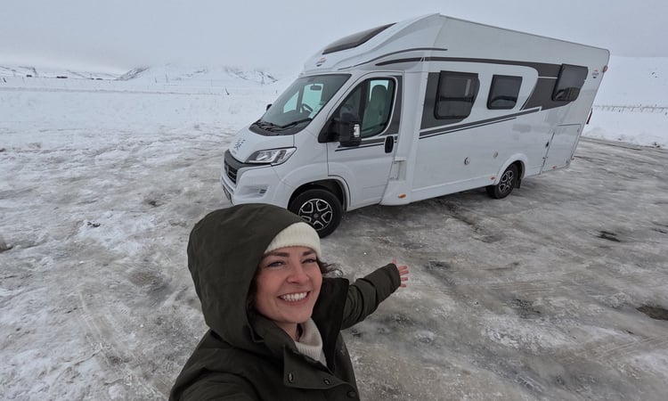 Motorhome in snow with Marissa