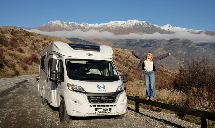Motorhome parked with mountains