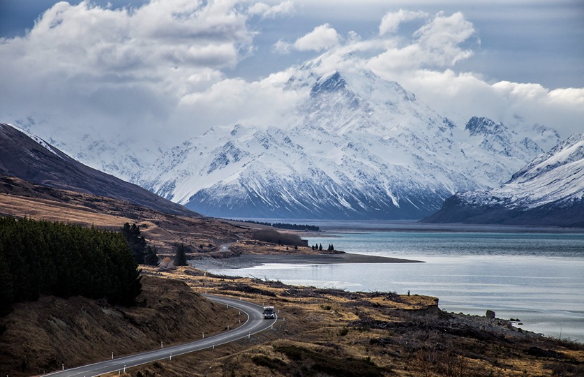Driving through scenic road with Mt Cook in the background