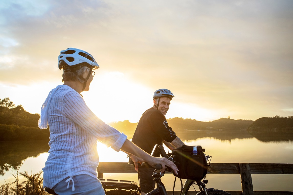 Senior couple cycling together