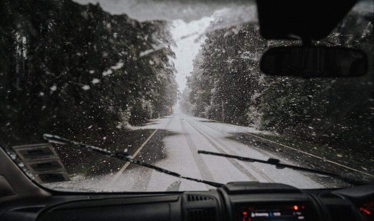 Driving through snowy conditions cab view