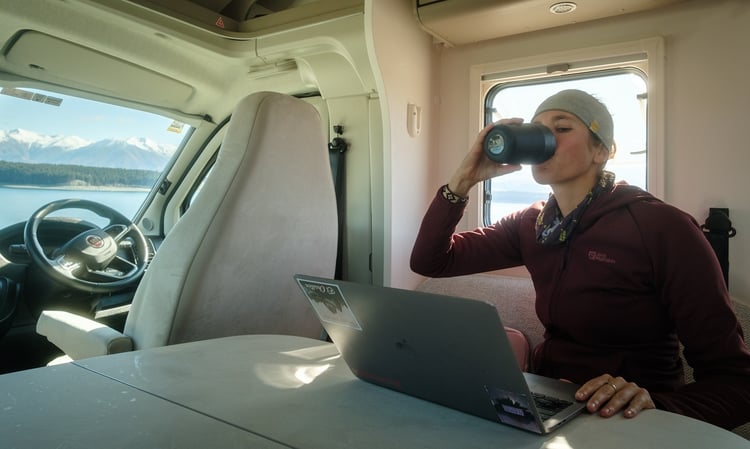 pukaki-lake-checking laptop