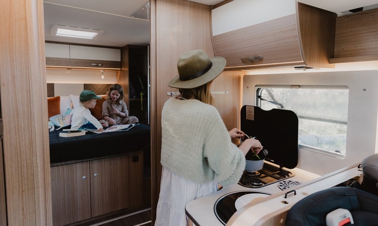 Interior kitchen cooking and rear bed