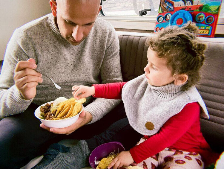 Eating beef nachos in motorhome