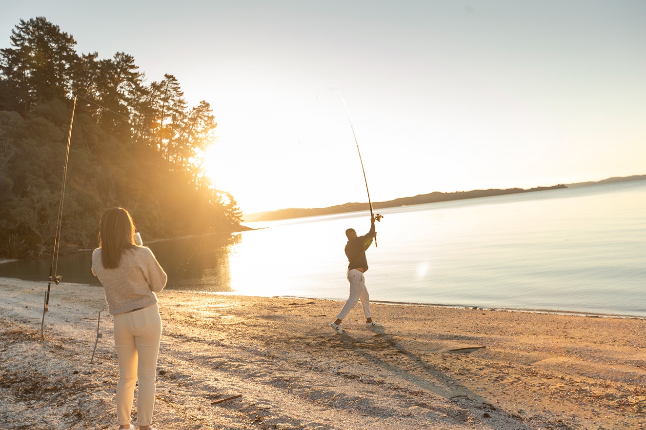 Man fishing by the beach