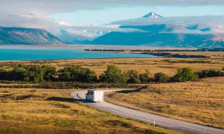 A Wilderness Motorhome driving at Lake Tekapo