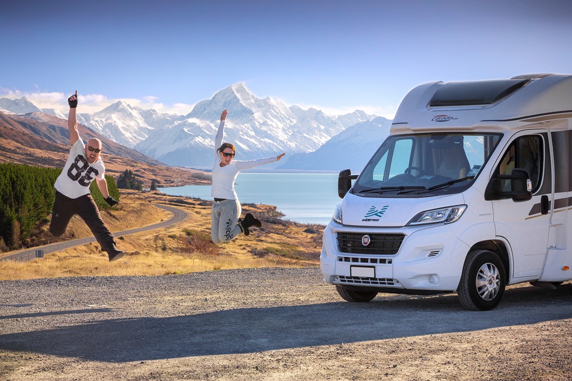A couple enjoying their holiday with their motorhome