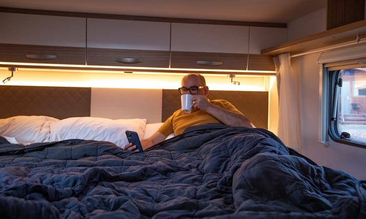 Cup of coffee in bed