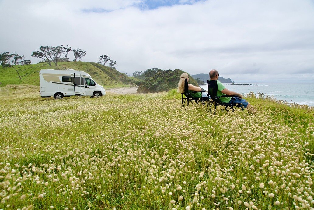 A Compact for 2 parked up at a freedom campsite