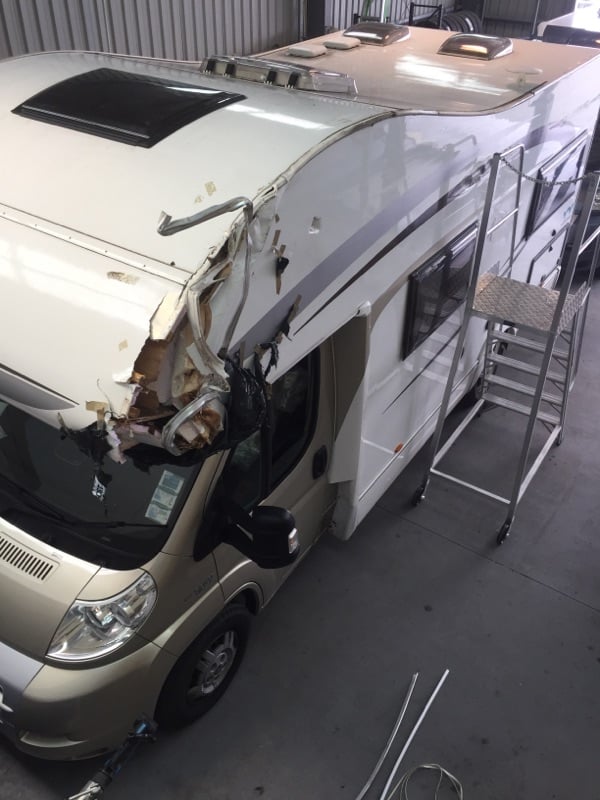 Overhead damage of motorhome luton