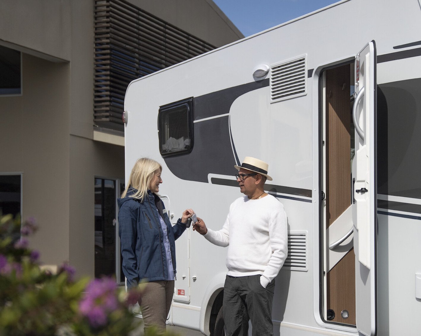 Handing over a motorhome to a guest at the Wilderness base