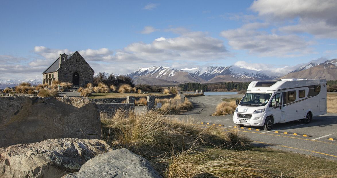 The Church of the Good Shepherd at Lake Tekapo with a motorhome nearby